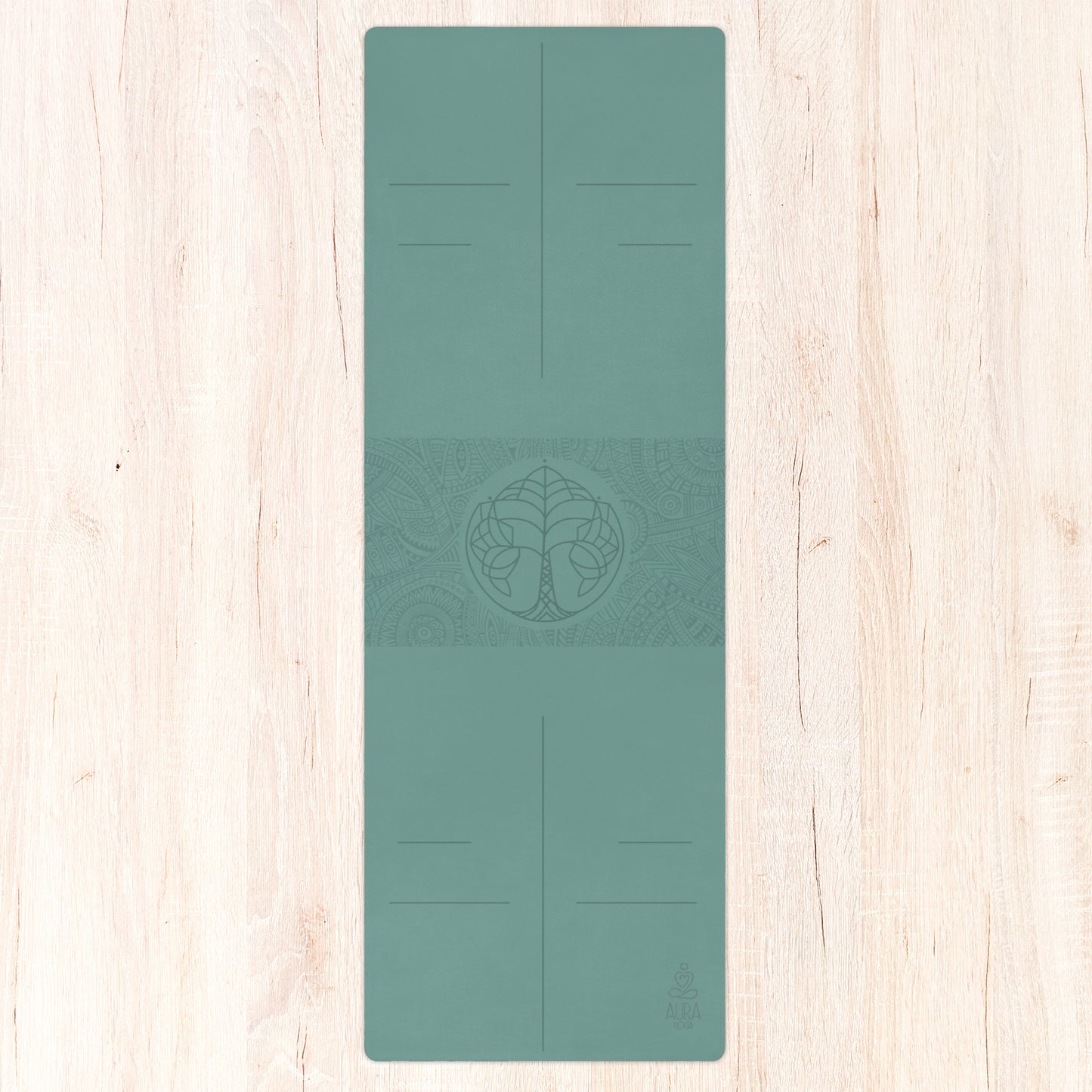 Calm green suede yoga mat with the tree of life in the center and alignment lines.