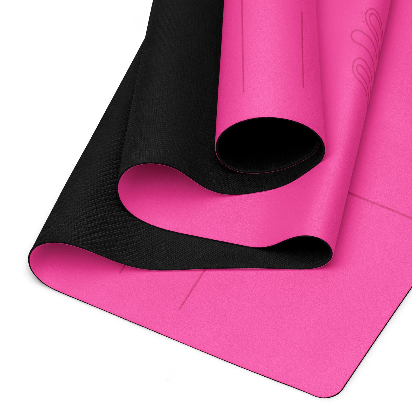 Detail of a bright pink suede yoga mat with rubber bottom