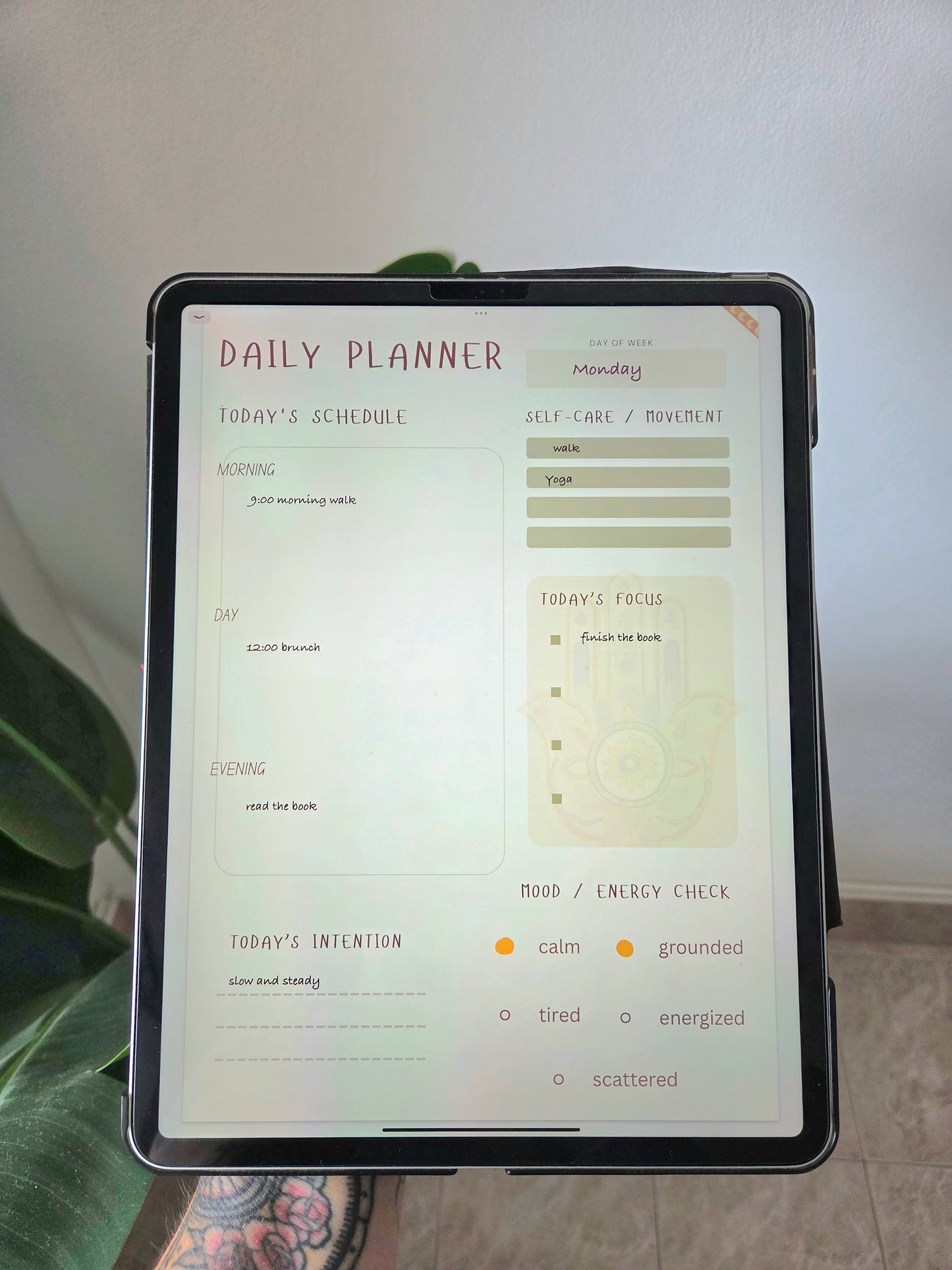 Person journaling into the digital journal, showcasing the daily planner page.